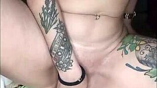 Intensely playing with dildo in pussy and butt plug in ass