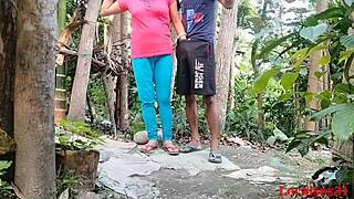 Village girlfriend in red t-shirt gets drilled by boyfriend outdoors at ranch.