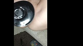 Intensely playing with dildo in pussy and butt plug in ass