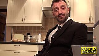 Submissive throating with ballgag in stockings during maledom session