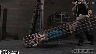 Angel cries as she endures her punishment in this intense scene.