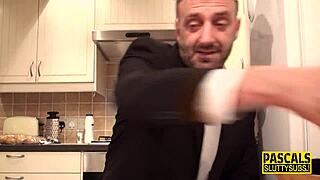 Submissive throating with ballgag in stockings during maledom session