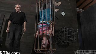 Angel cries as she endures her punishment in this intense scene.