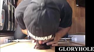 Ebony guy deepthroats dilf at gloryhole