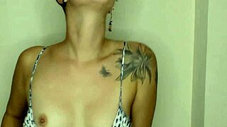 Big Tits Brunette Babe Shows Downblouse While Cleaning House