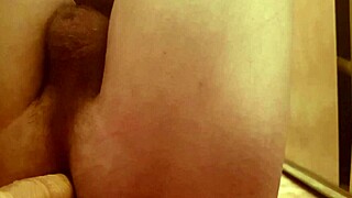 guy teases his ass with dildo in bath