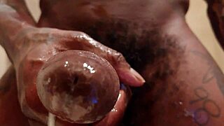 Men admiring an enormous black phallus with John Paul Reese’s shamelessness