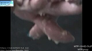 Japanese girl shows off manicured nails