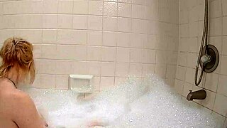 annie archer gets wet in wild shower scene.