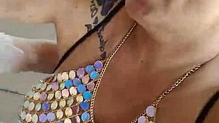 My wife’s a sexy exhibitionist! I love watching her flash those big pierced tits in public!