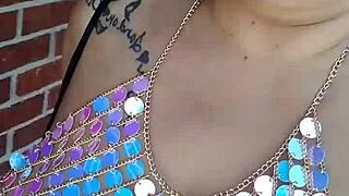 My wife’s a sexy exhibitionist! I love watching her flash those big pierced tits in public!