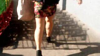 Milf with big ass walking on the street