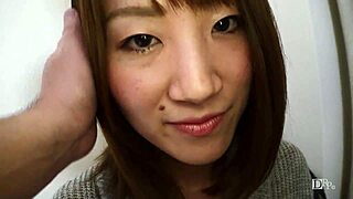 Japanese beauty begs for graffiti on submissive body during blowjob.