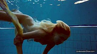 Petite Teen Milana Voda Swims Naked in Public Pool. Her Body Shines Underwater