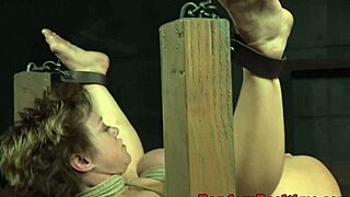 Bound submissive gets punished with pump and vibrator in rough garage scene.