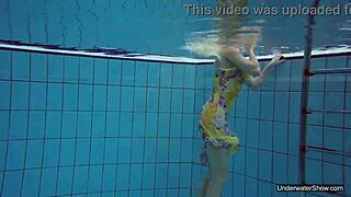Petite Teen Milana Voda Swims Naked in Public Pool. Her Body Shines Underwater