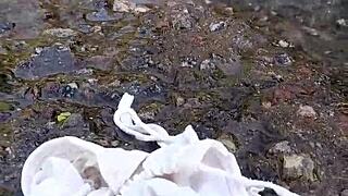 Argentinian Brunette Exhibitionist Bathes Outdoors with Natural Tits Exposed.