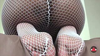 just chilling with white fishnets, dominating in a kinky fetish scene
