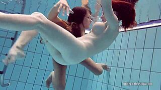 Wow! Katrin Privsem and Lucy Gurchenko dive deep as underwater bikini babes in pool action