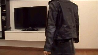 Look at daniela posing in kneehigh leather boots and skirt