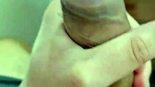 The slender then the gay masturbate using a condom