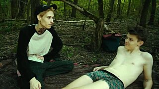 Two friends get wild with fun in nature after picnic.