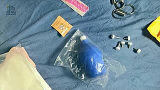 A video of unpacking and opening a 50 inch, silicone hentai doll with.highlighted features