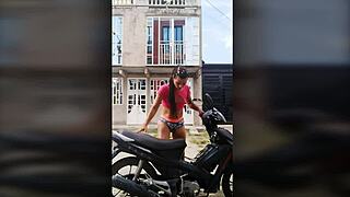 ts angelique monroe washing her bike outdoors
