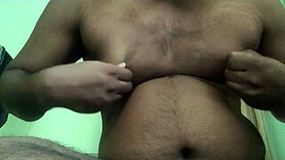 chubby guy fondles his moobs and cums