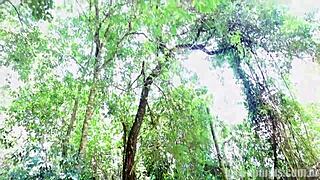 Crossdressing stud with a monster black cock bangs bareback in the woods.