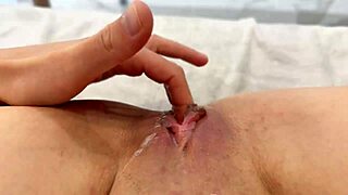 An Asian girl POV masturbates her shaved, dripping pussy and clit.