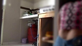 in the kitchen, she's getting all hot and bothered, loving that standing fuck