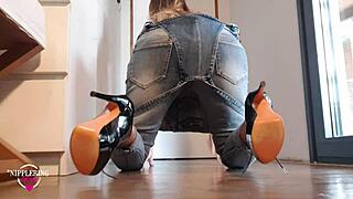 Nippleringlover's hot mom in jeans and high heels showcases her pierced pussy and asshole with big nipple rings and chains