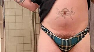 showing off my phat azz in the bathroom with thong