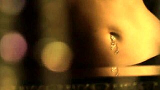 brunette lover performs as a belly dancer, ripping clothes and undressing nude in erotic indian dance