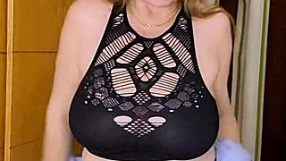 busty milf mariaold works a dildo for intense titty fucking.