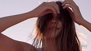 hey, watch petite talia mint stroke herself on public beach