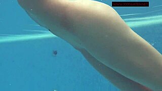 Lina Mercury enjoys hot underwater shower as naked teen 18+ in sauna.