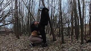 wife sucking dick topless in public park