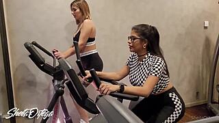 Lesbians get hot in the gym and head to the bathroom to fuck.