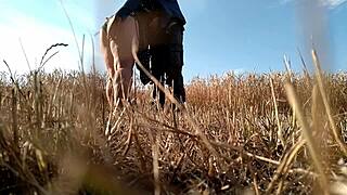 Imagine this sexy milf in a dress giving a handjob in the field?