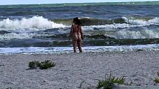 Wow, public sex on the beach gets so wild with doggystyle! 🌊