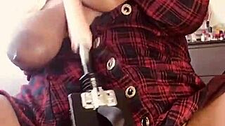 A big titty slut gets fucked by a machine