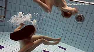hey, watch iva brizgina and paulinka as hot softcore lesbians in the pool.