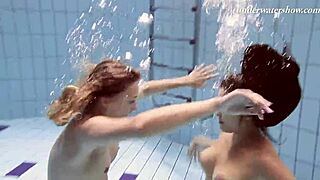 hey, watch iva brizgina and paulinka as hot softcore lesbians in the pool.