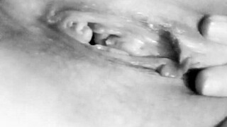 busty milf caresses herself to orgasm close-up