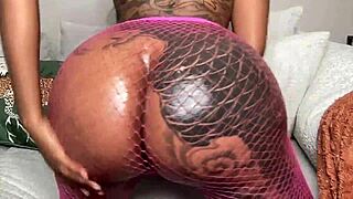 ebony girl teases with pink fishnets twerk