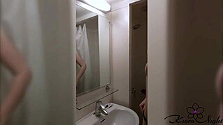 Blonde boldly strokes and fingers her wet pussy in steamy shower amateur clip