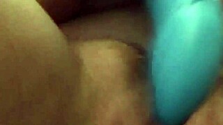 Dirty tattooed whore uses vibrator for insertion on hidden camera, showing her tits in solo fetish.