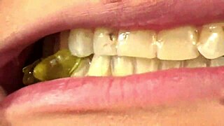 Mouth vore close up of fifi foxx eating gummy bears